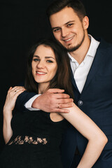 happy young stylish fashion couple smiling. Man and pregnant woman