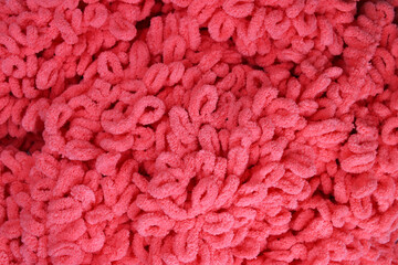 Yarn with loops pink for hand knitting, background