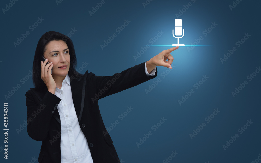 Wall mural caucasian businesswoman talking on her cell phone and pointing to microphone flat icon over gradient