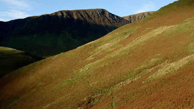 Drone footage during Autumn Winter light of Knott Rigg in the English Lake District, uk.