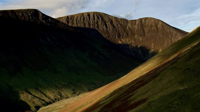 Drone footage during Autumn Winter light of Knott Rigg in the English Lake District, uk.