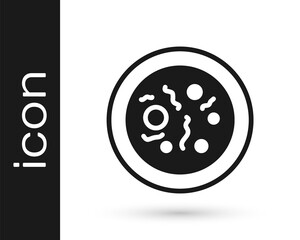 Black Petri dish with bacteria icon isolated on white background. Vector.