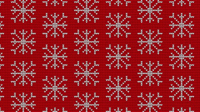 Christmas knitted background with falling snowflakes. Xmas winter ornament video pattern. Looped animation.