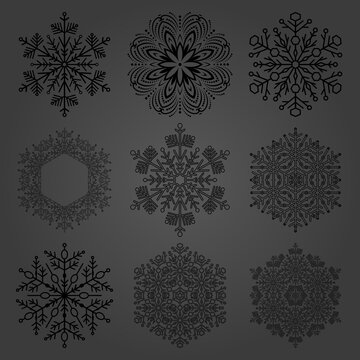 Set of black snowflakes. Fine winter ornaments. Snowflakes collection. Snowflakes for backgrounds and designs