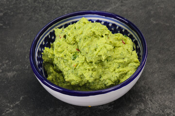 Avocado guacamole sauce with chili pepper