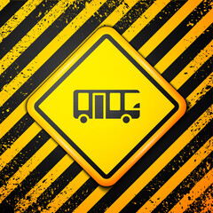 Black Airport bus icon isolated on yellow background. Warning sign. Vector.