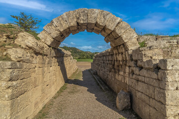 Ruins of the Crypt, an arched way to the Olympic Stadium in the archeological site of Olympia, Greece, a major Panhellenic religious sanctuary of ancient Greece