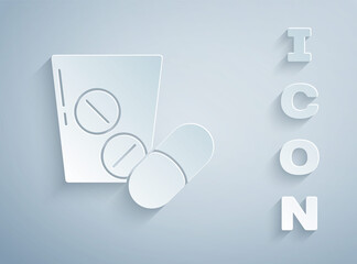 Paper cut Medicine pill or tablet icon isolated on grey background. Capsule pill and drug sign. Pharmacy design. Paper art style. Vector.