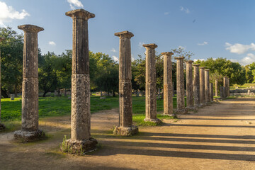 Ruins of the Palestra in the archeological site of Olympia, Greece, a major Panhellenic religious sanctuary of ancient Greece, where the ancient Olympic Games were held.