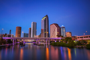 Fototapeta na wymiar Tampa skyline after sunset with Hillsborough river in the foreground