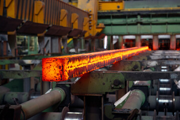 Steel production in electric furnaces. Sparks of molten steel. Electric arc furnace shop . Metallurgical production, heavy industry, engineering, steelmaking