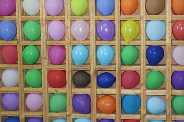 lots of colorful balloons for target and Darts