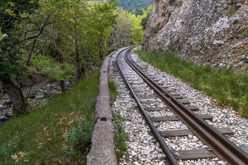 Obraz premium The Diakopto–Kalavryta railway, a historic rack railway runnning 22 km from Diakopto through the Vouraikos Gorge to the old Mega Spilaion Monastery, Zachlorou and up to Kalavryta. Peloponnese, Greece