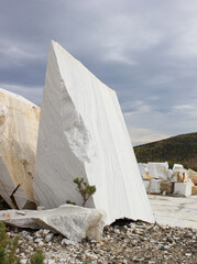 A blocks of white marble at the field