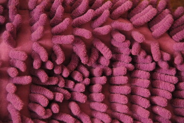 Crimson wool fabric with large pile close-up