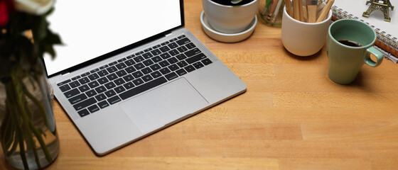Workspace with laptop, coffee mug, supplies and copy space, include clipping path