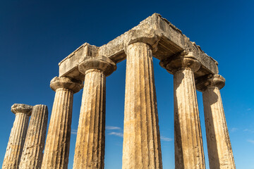 Ruins of the Temple of Apollo in Ancient Corinth, Peloponnese, Greece. For Christians, Corinth is...