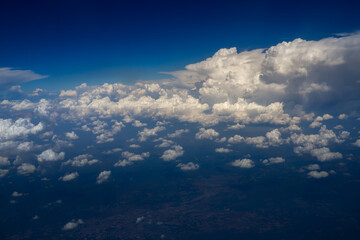 Fototapeta na wymiar view from the airplane window, above the clouds and sky