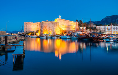 Blue hour view in Kyrenia harbour on . Kyrenia harbor is a famous tourist resort.