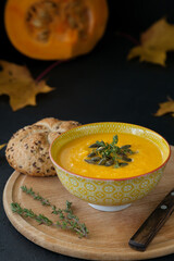Homemade tasty pumpkin cream soup with cheese