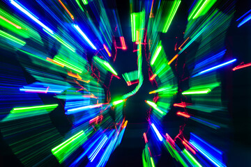 Defocused Image abstract background of moving colorful lights