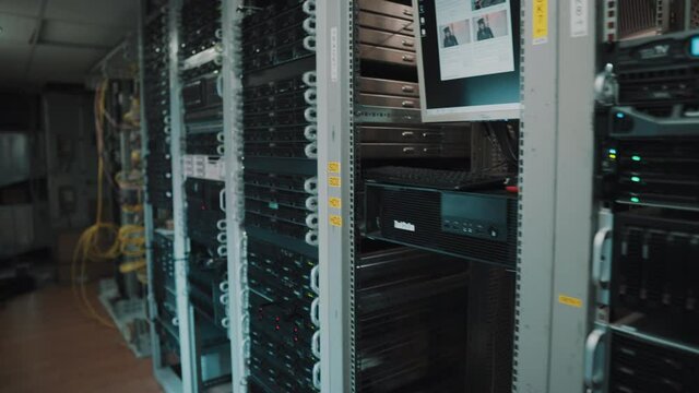 Blinking LEDs Of Server Stack With Hard Drives In A Datacenter