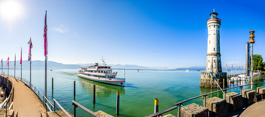 famous harbor with sailboats at the historic island of Lindau am Bodensee - Germany - obrazy, fototapety, plakaty