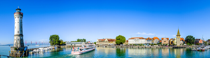 Fototapeta na wymiar famous harbor with sailboats at the historic island of Lindau am Bodensee - Germany