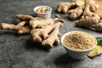Dry, fresh and capsuled ginger on grey table. Space for text