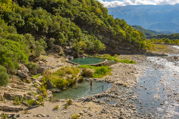 Stream of hot sulfuric water in the thermal baths of Permet Albania