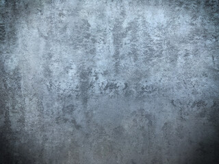 Fototapeta na wymiar Grunge style. Close-up photo of concrete texture detail, There is a vignette at the corner of the image and a bright spot in the center is a copyspace. The gray and dark cement background is old.