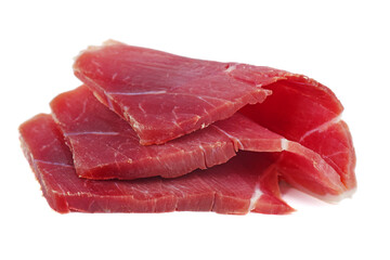 Sliced piece of cured ham isolated on the white background