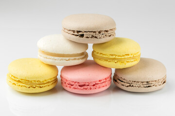 Sweet and colourful macaroons on white background 