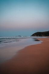 Fototapeta na wymiar Beautiful beach landscape of the Basque Country Spain. Beach wave textures