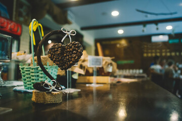 Composition of coffee beans in a restaurant on the bar. Installation of coffee beans in the restaurant at the bar. Artistic composition of coffee beans in the bar