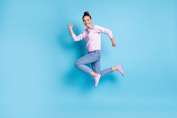 Fototapeta na wymiar Full length body size profile side view of her she nice attractive pretty lovely cheerful cheery girl jumping running sprint marathon isolated bright vivid shine vibrant blue color background