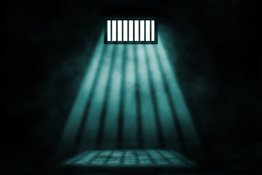 Freedom Concept : Prison inside interior with sunlight lighting through window in dark room.
