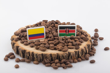 a Colombian flag placed over roasted coffee beans.