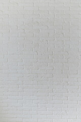 Big vertical white brick wall