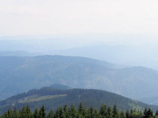 view from the Lysa hora mountain of the mountain landscape on a sunny summer day, hiking and traveling