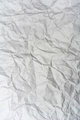white crumpled paper texture background.