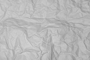 white crumpled paper texture background.