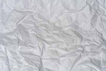 white crumpled paper texture background.