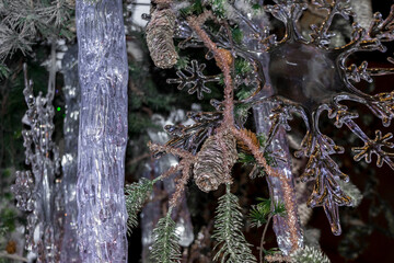 Christmas night background with ice figures and garlands glowing in the dark. Fairy winter forest.