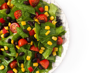 Mexican salad with black beans, corn,tomatoes,lettuce and pepper isolated on white background