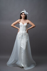 Portrait of beautiful young bride wedding dress