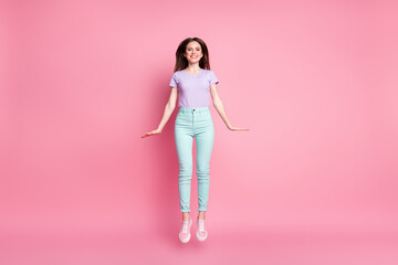 Full length photo of cute charming girl jump enjoy spring rest relax wear good look clothes gumshoes isolated over pink color background