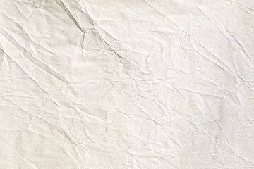 Old brown crumpled paper background texture
