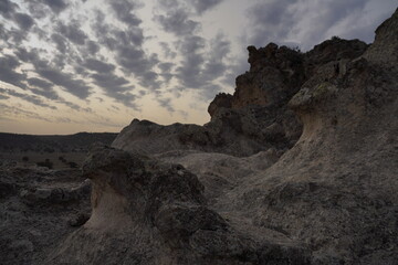 Obraz premium Sunset rain clouds in the rocky landscape in Phrygian Valley Park