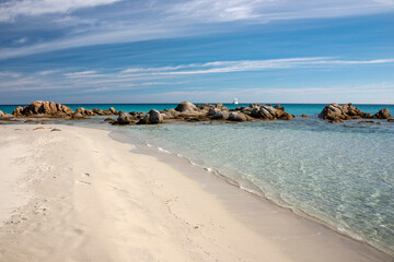 Fototapeta na wymiar rocks and emerald water in a tropic Notteri beach